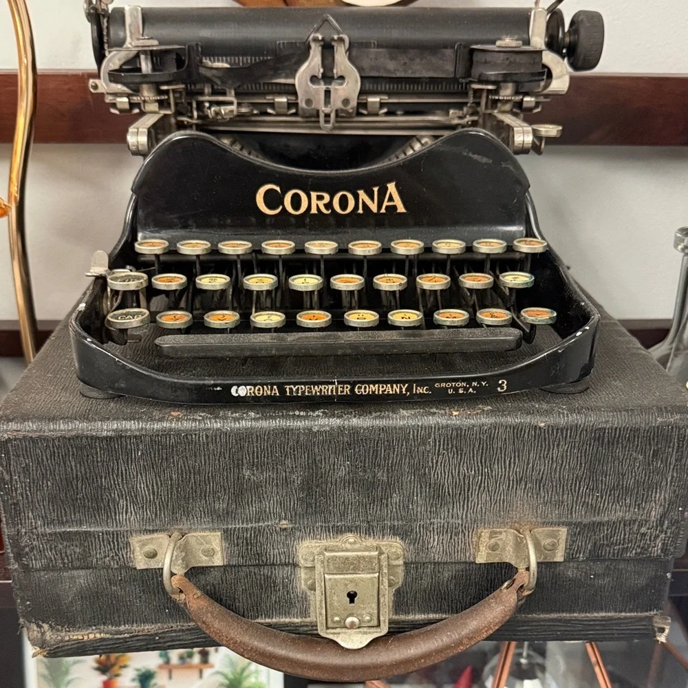 Corona Black Portable Typewriter with Gold Logo